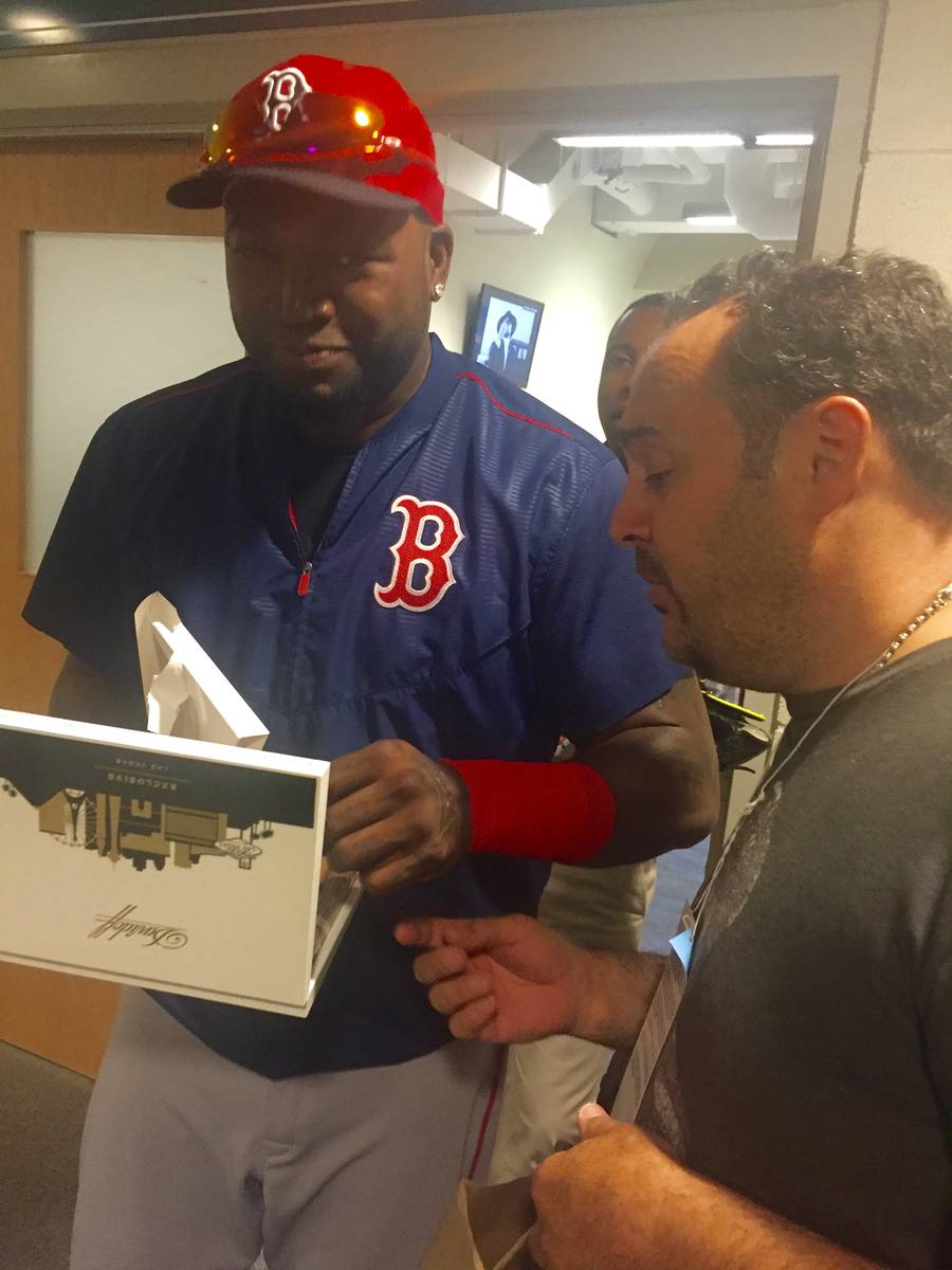 Chef Barry Dakake presents David "Big Papi" Ortiz of the Boston Red Sox a box are shown at Dodg ...