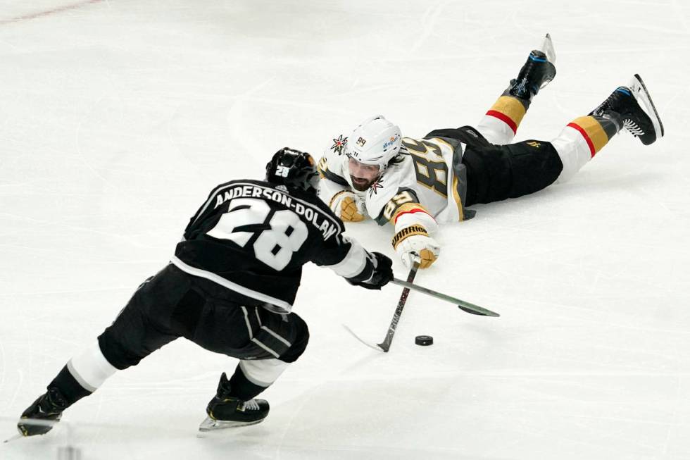 Los Angeles Kings center Jaret Anderson-Dolan, left, and Vegas Golden Knights right wing Alex T ...