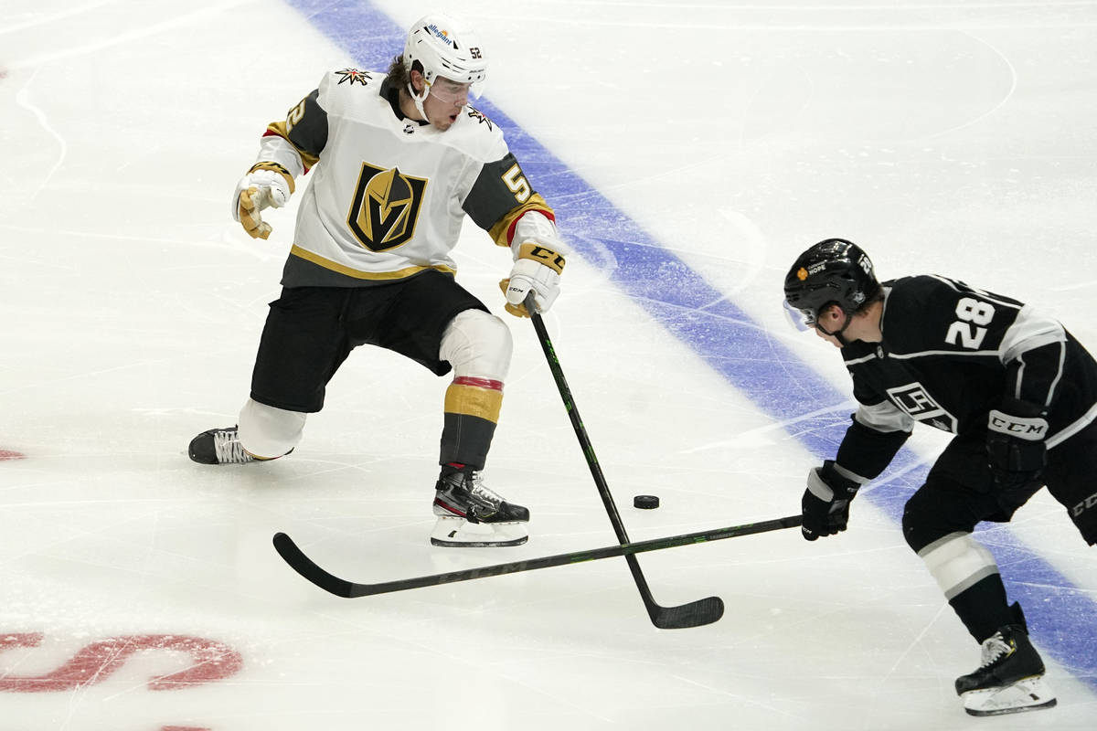 Vegas Golden Knights defenseman Dylan Coghlan, left, and Los Angeles Kings center Jaret Anderso ...