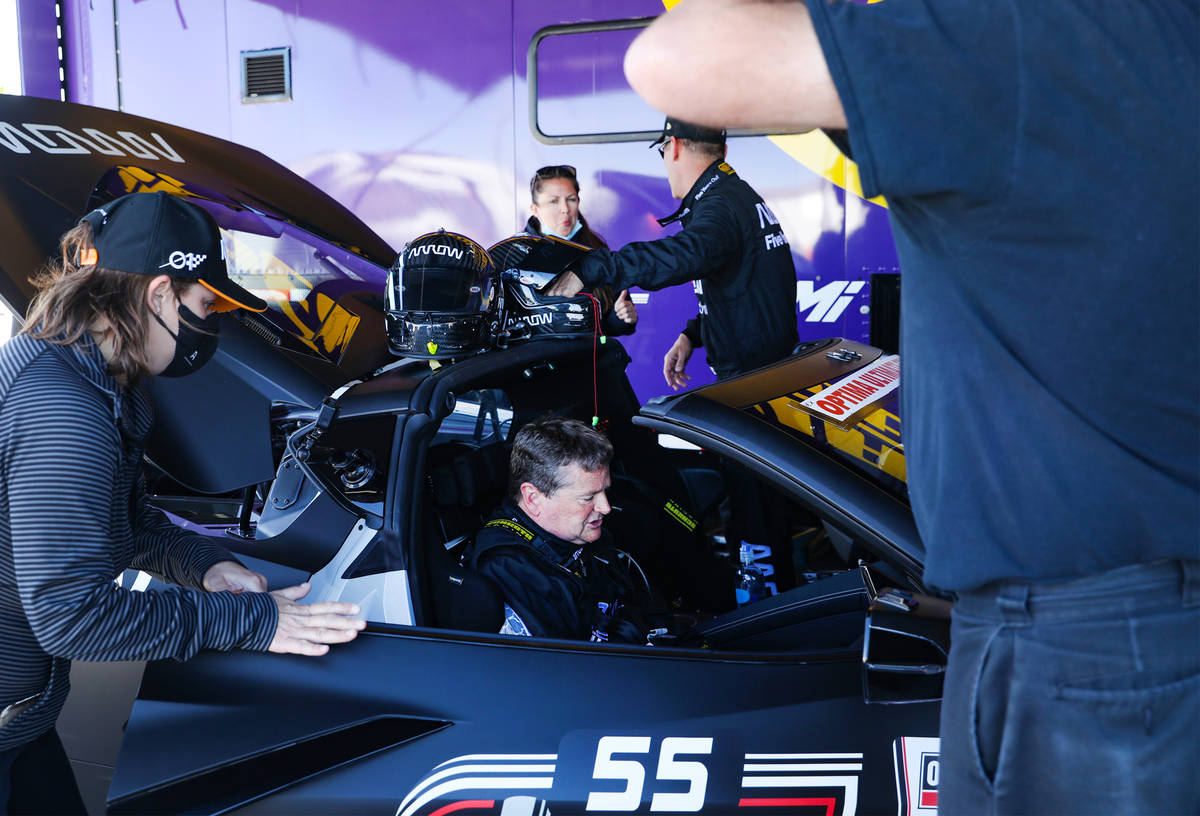 Quadriplegic race car team owner Sam Schmidt has help preparing to race at the Ultimate Street ...