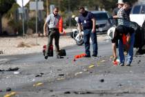 Las Vegas police investigate a crash at the intersection of Warm Springs Road and South Schirll ...