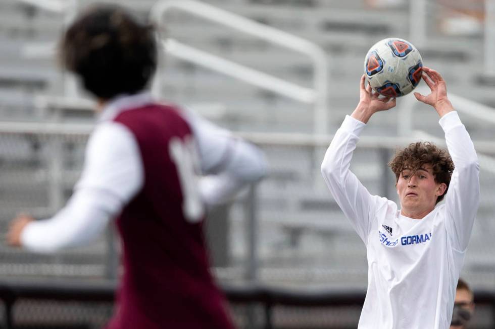 Bishop Gorman defender Daniel Mazzeo (2) passes from the sidelines during their high school soc ...