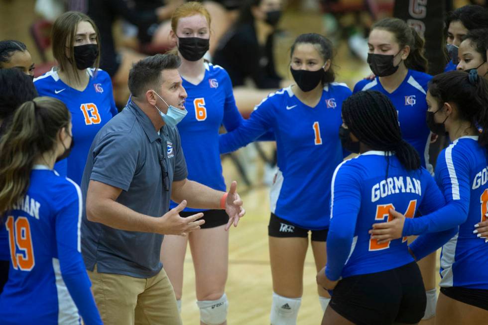 Bishop Gorman's coach Gregg Nunley speaks to his team in a time out during their girls high sch ...