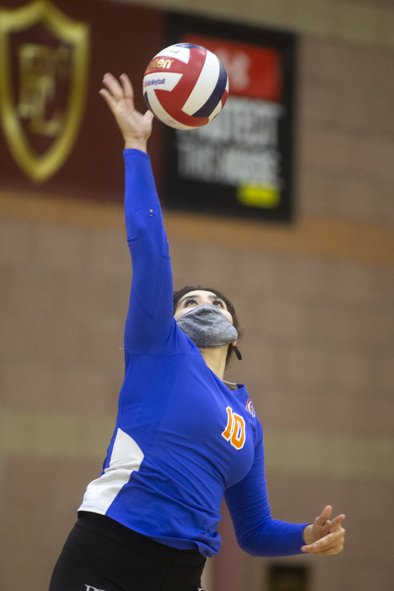 Bishop Gorman's Julianne Carlat (10) serves against Faith Lutheran during a girls high school v ...