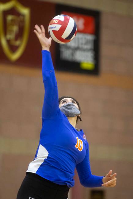 Bishop Gorman's Julianne Carlat (10) serves against Faith Lutheran during a girls high school v ...