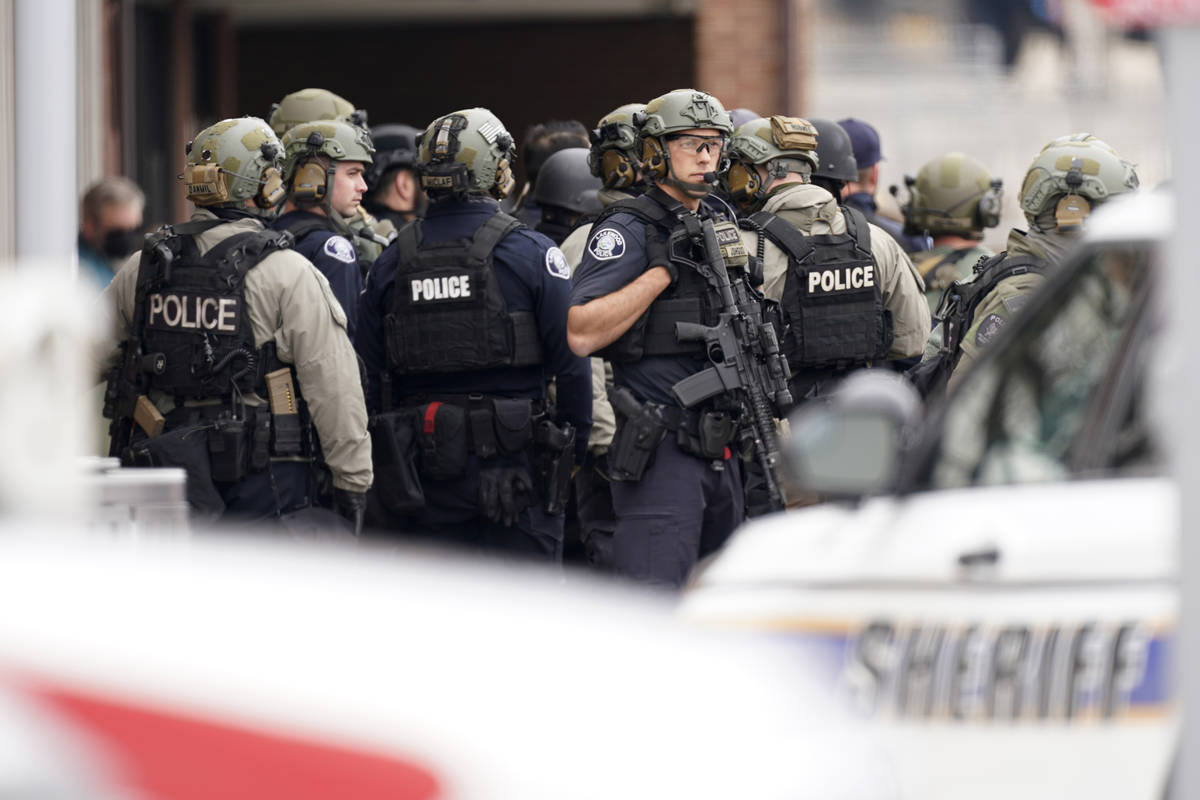 Police outside a King Soopers grocery store where a shooting took place Monday, March 22, 2021, ...