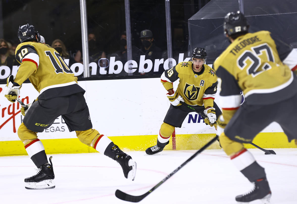 Golden Knights' Reilly Smith (19) looks to pass the puck during the first period of an NHL hock ...