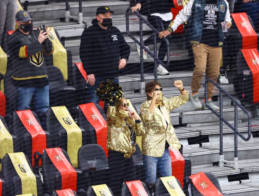 Golden Knights fans celebrate a goal by Mark Stone, not pictured, against the St. Louis Blues d ...