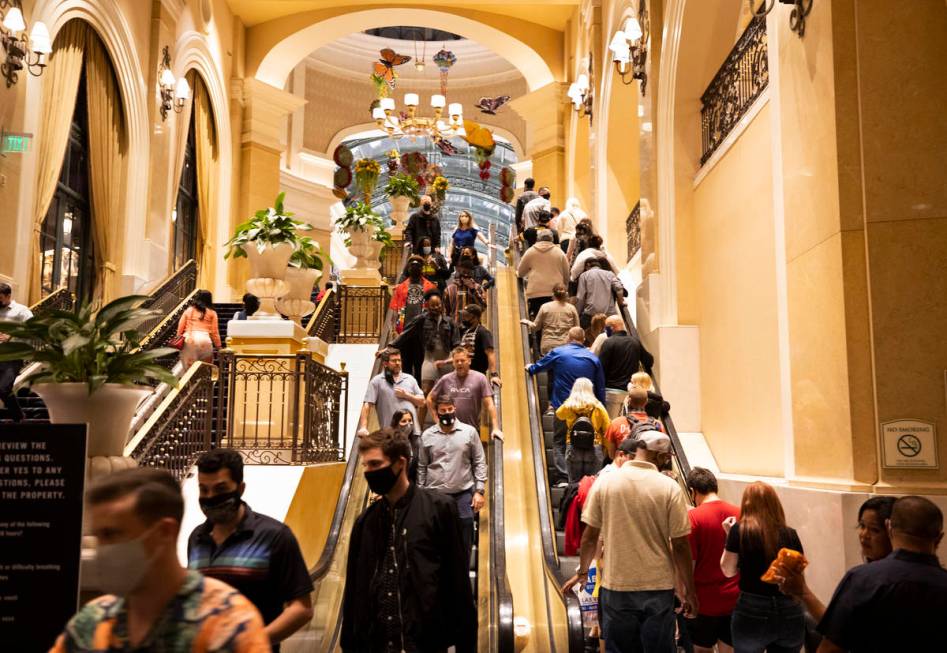 The entrance to the Bellagio is packed on March 19 as March Madness, spring break and St. Patri ...