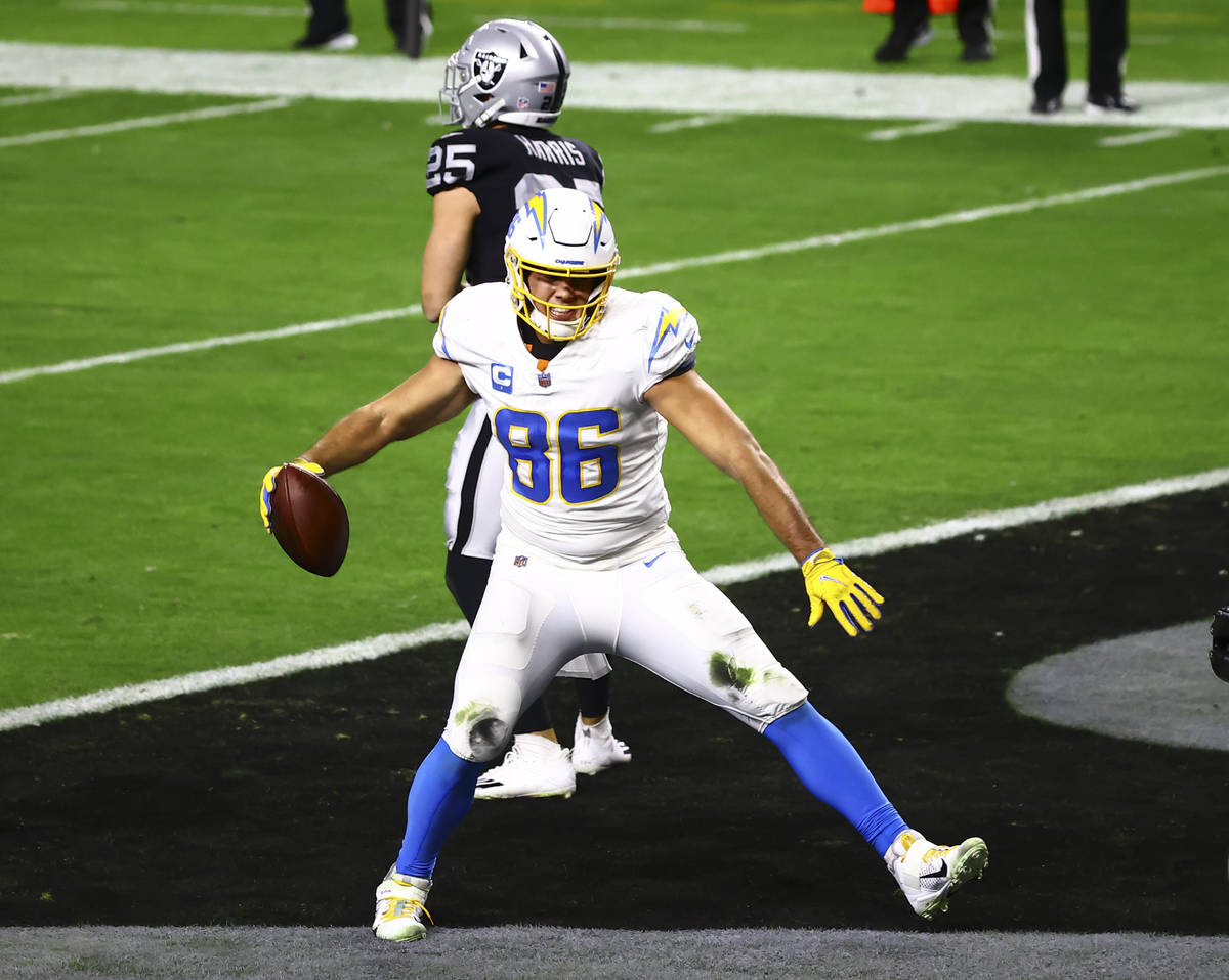 Los Angeles Chargers tight end Hunter Henry (86) scores a touchdown against the Raiders in the ...