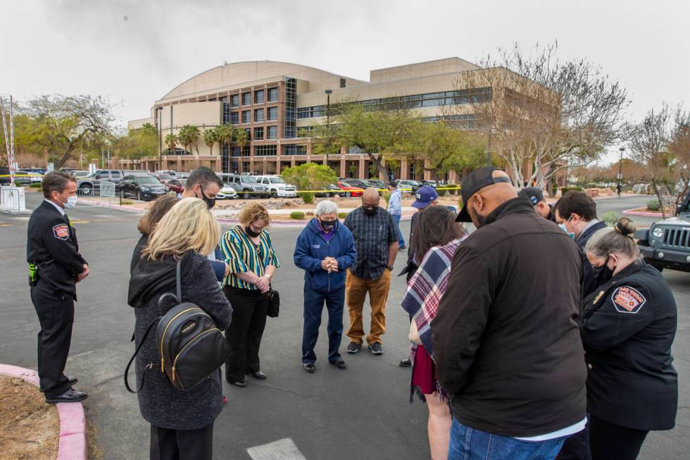 Senior Chaplain Ty Chew gives a prayer of thanks after a suspicious item on the ground was inve ...