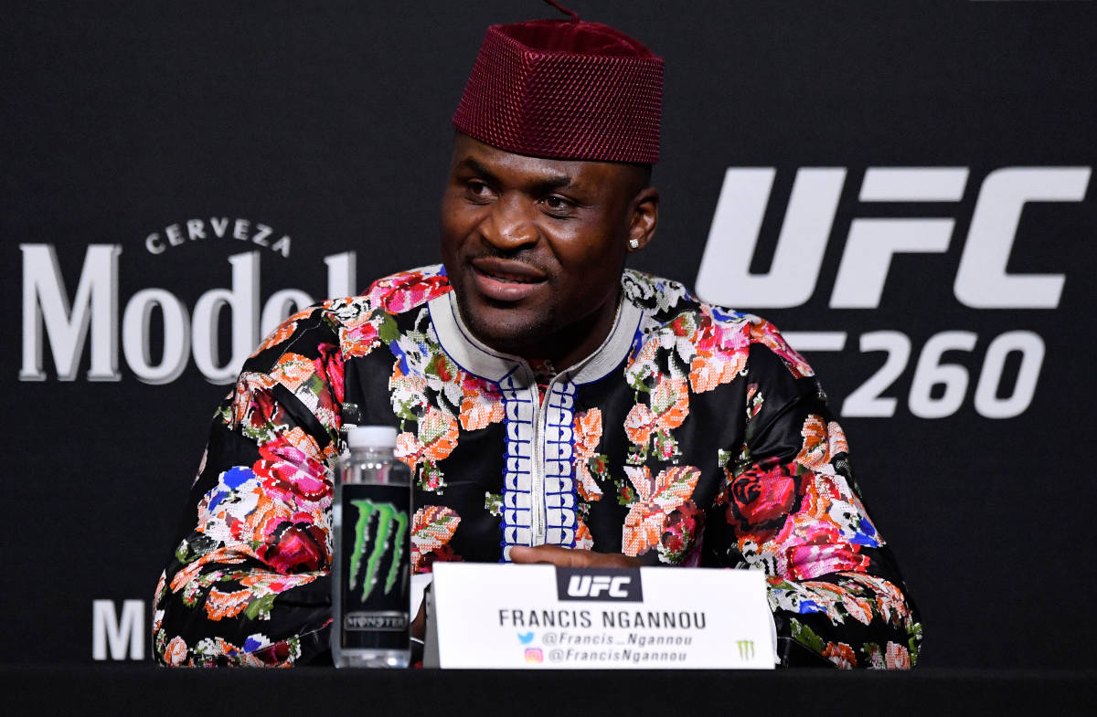 Francis Ngannou of Cameroon interacts with media during the UFC 260 press conference at UFC APE ...