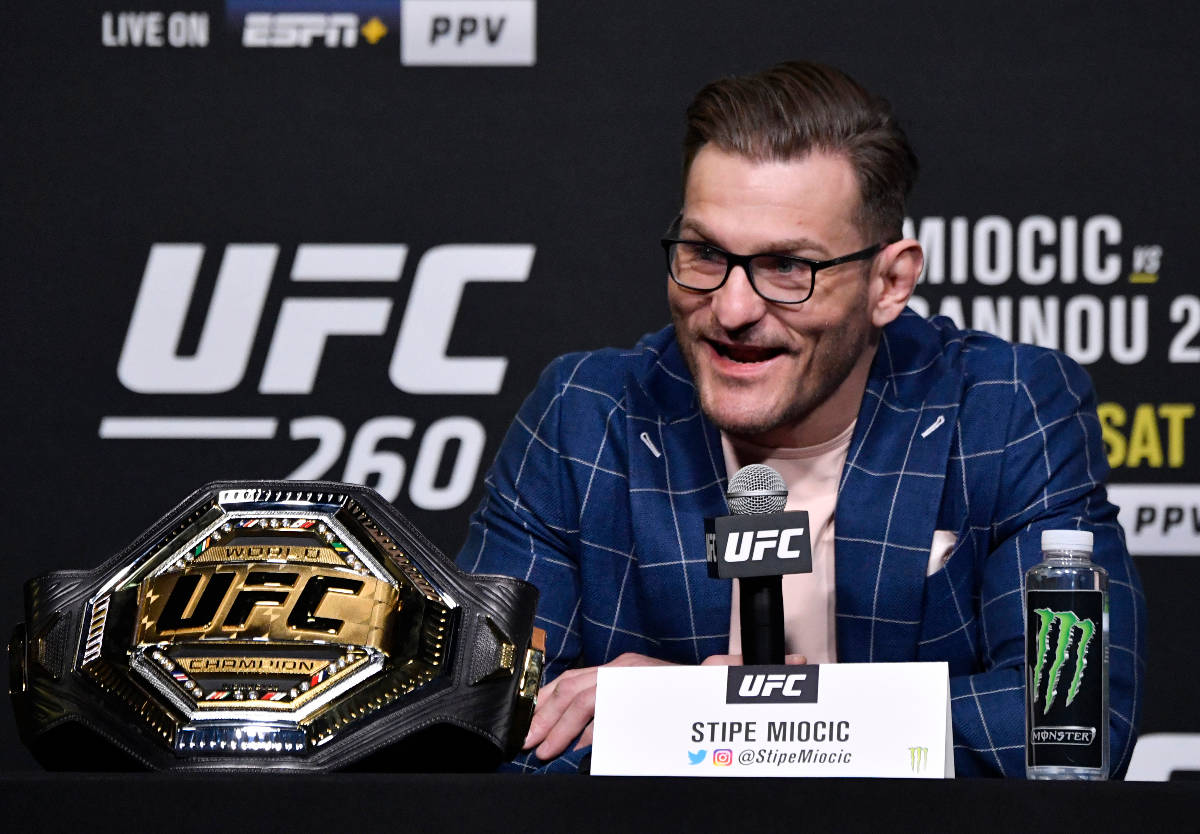 Stipe Miocic interacts with media during the UFC 260 press conference at UFC APEX on March 25, ...