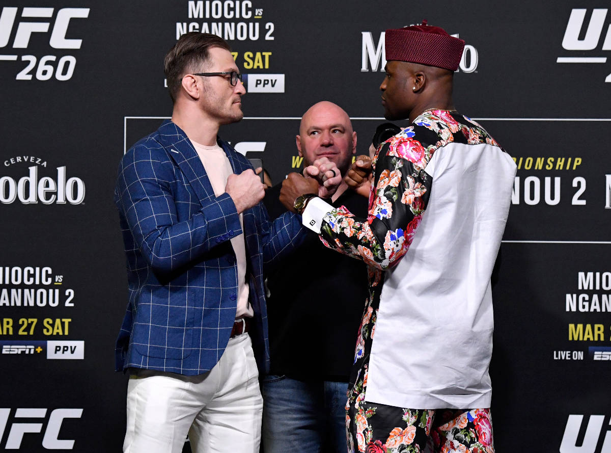 Opponents Stipe Miocic and Francis Ngannou of Cameroon face off during the UFC 260 press confer ...