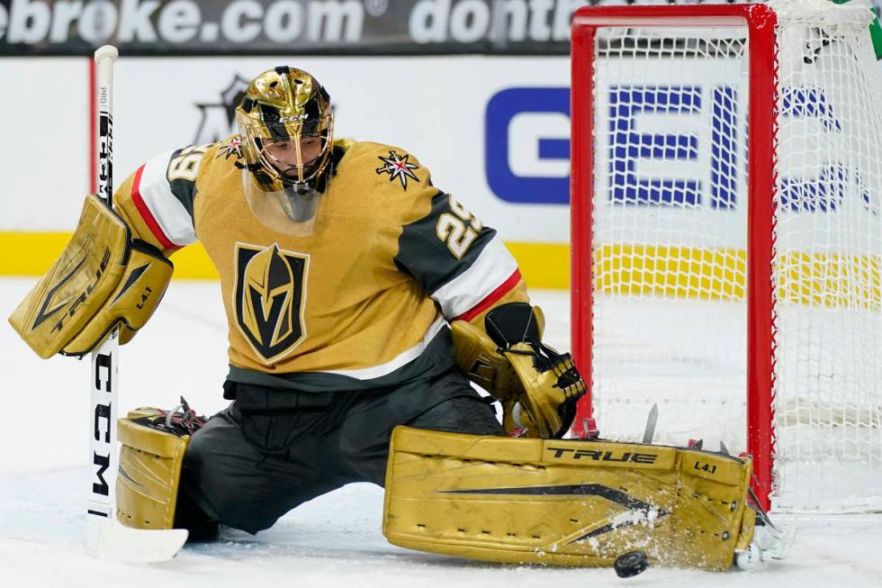 Vegas Golden Knights goaltender Marc-Andre Fleury (29) deflects the puck during the first perio ...