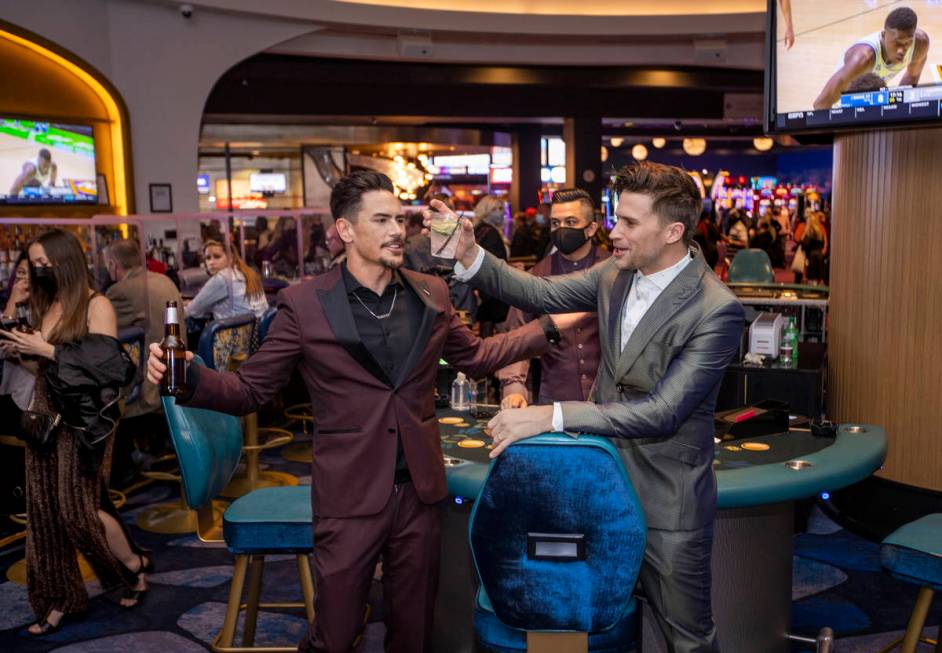 Tom Sandoval, left, and Tom Schwartz, both with Vanderpump Rules celebrate with a drink in the ...