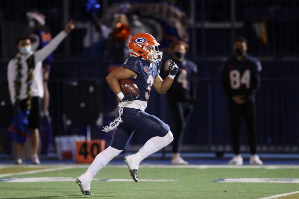 Bishop Gorman's Cam'ron Barfield (3) runs the ball for a touchdown in the first quester of a fo ...