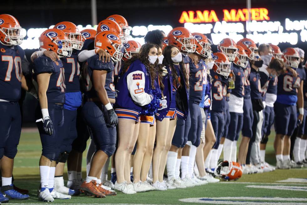 Bishop Gorman celebrate their win against Faith Lutheran in a football game at Bishop Gorman Hi ...