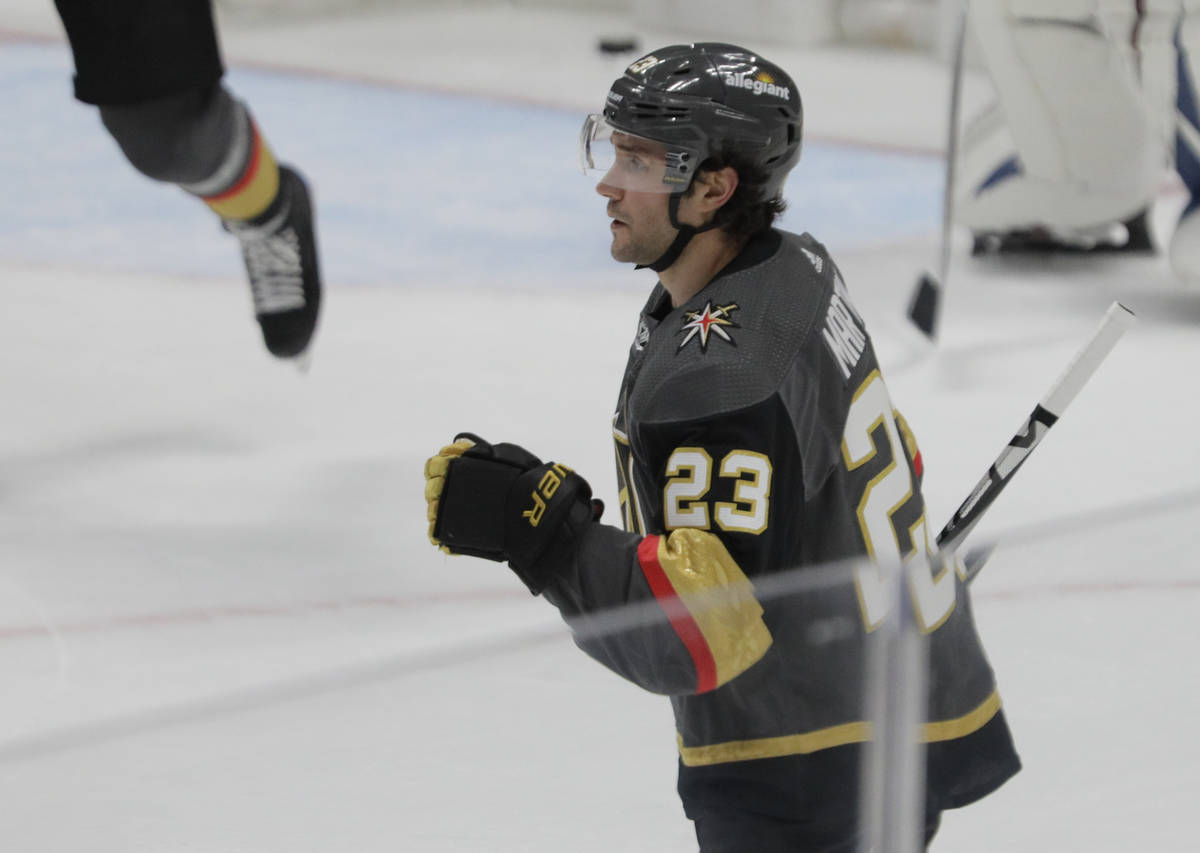 Vegas Golden Knights defenseman Alec Martinez (23) pumps his fist after a goal against the Colo ...