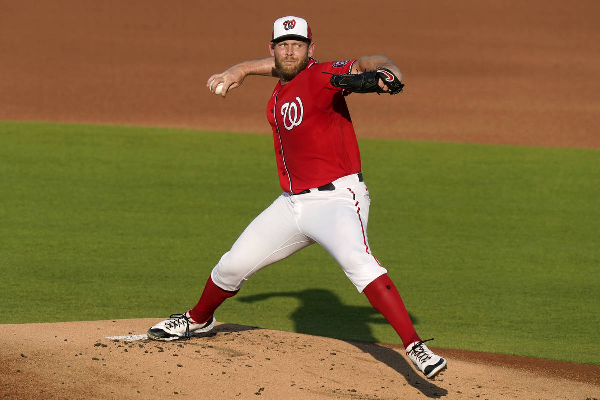 Washington Nationals starting pitcher Stephen Strasburg throws during the first inning of a spr ...