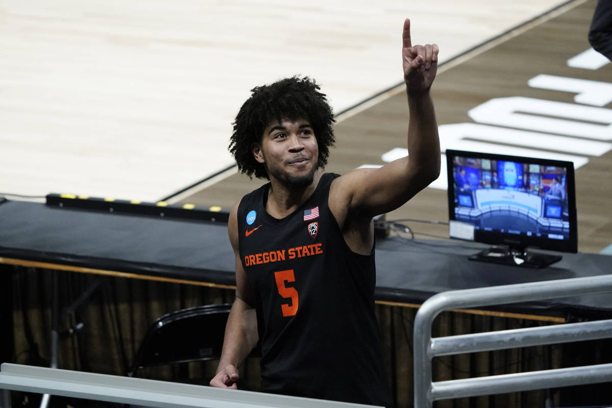 Oregon State guard Ethan Thompson celebrates after a Sweet 16 game against Loyola Chicago in th ...