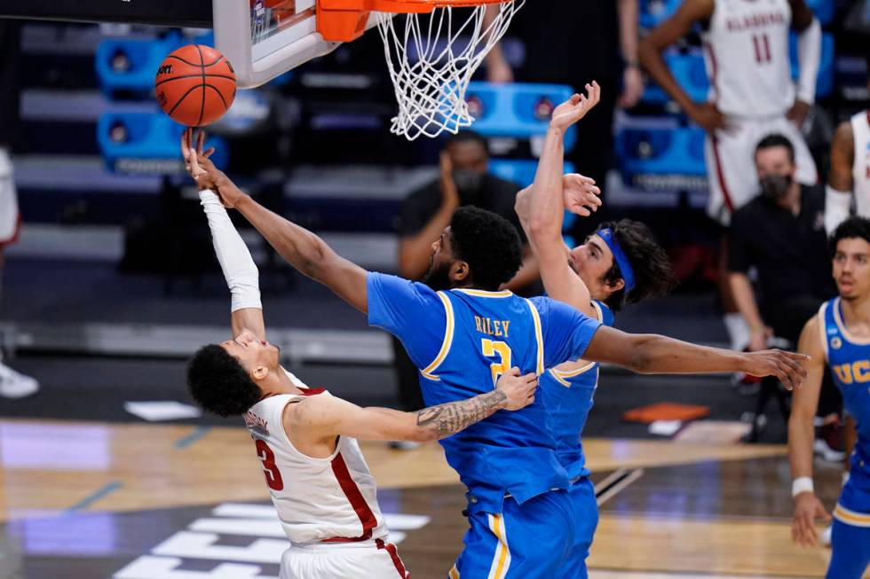 UCLA forward Cody Riley (2) blocks a Alabama guard Jahvon Quinerly (13) shot in overtime of a S ...