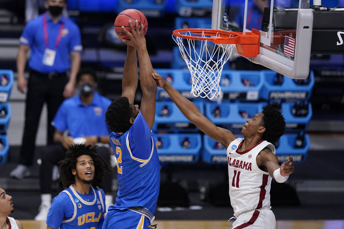 UCLA forward Cody Riley (2) dunks on Alabama guard Joshua Primo (11) in the second half of a Sw ...