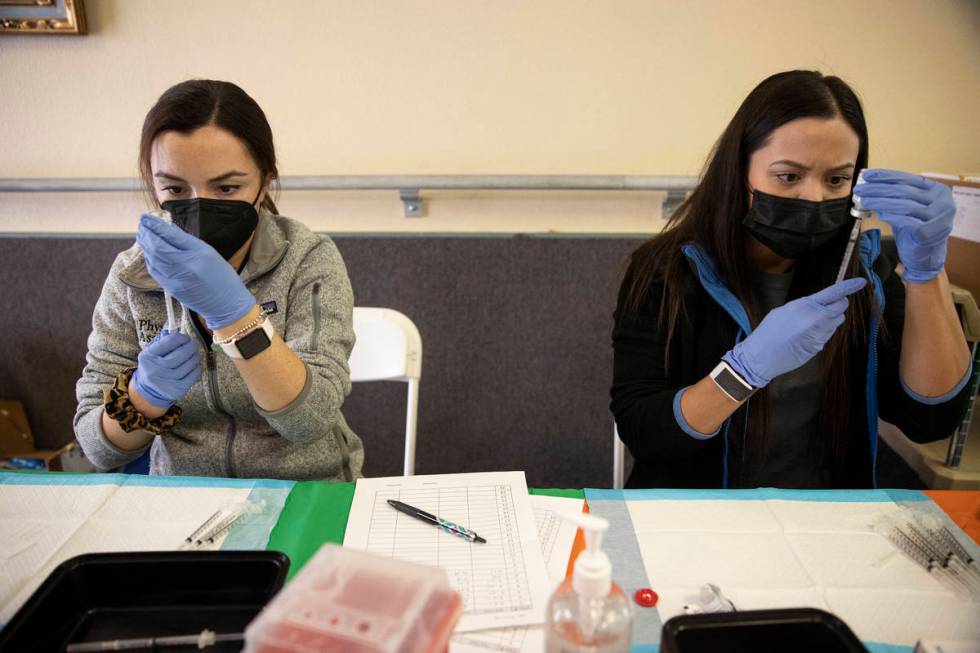 Touro University Nevada physician assistant students Madison Ginis, left, and Rhianna McGowan, ...