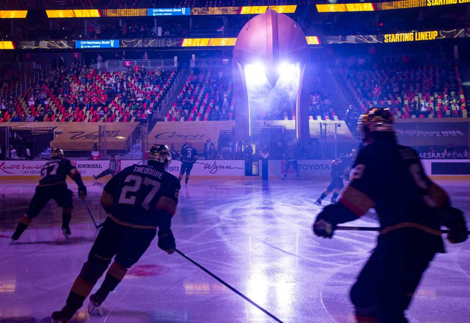 The Golden Knights warm up before playing the Los Angeles Kings in an NHL hockey game at T-Mobi ...