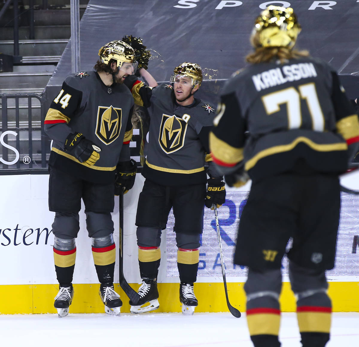 Golden Knights' Nicolas Hague (14) celebrates his goal with Jonathan Marchessault during the se ...