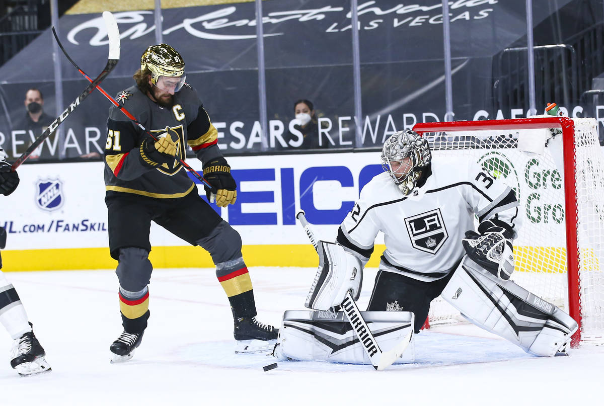 Los Angeles Kings goaltender Jonathan Quick (32) blocks the puck in front of Golden Knights' Ma ...