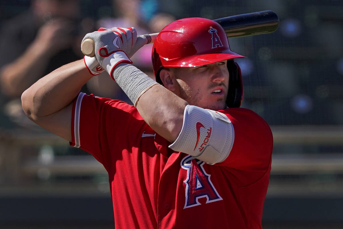Los Angeles Angels' Mike Trout hits against the Oakland Athletics during the third inning of a ...