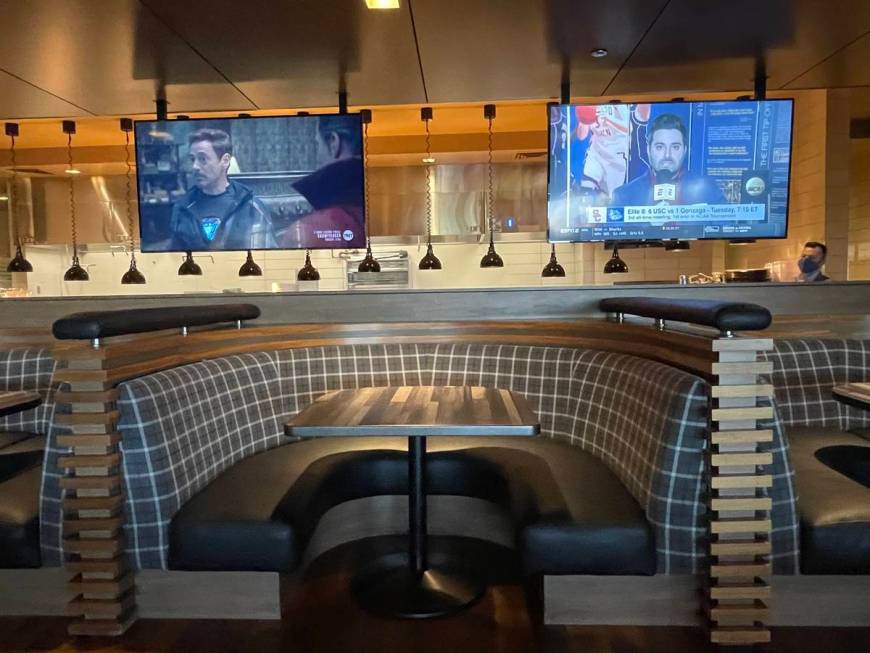 A booth at the Raiders Tavern & Grill inside the M Resort as seen on March 29, 2021. (Mick Aker ...