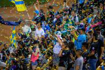 Las Vegas Lights FC fans celebrate a goal versus the Orange County SC as confetti rains down at ...