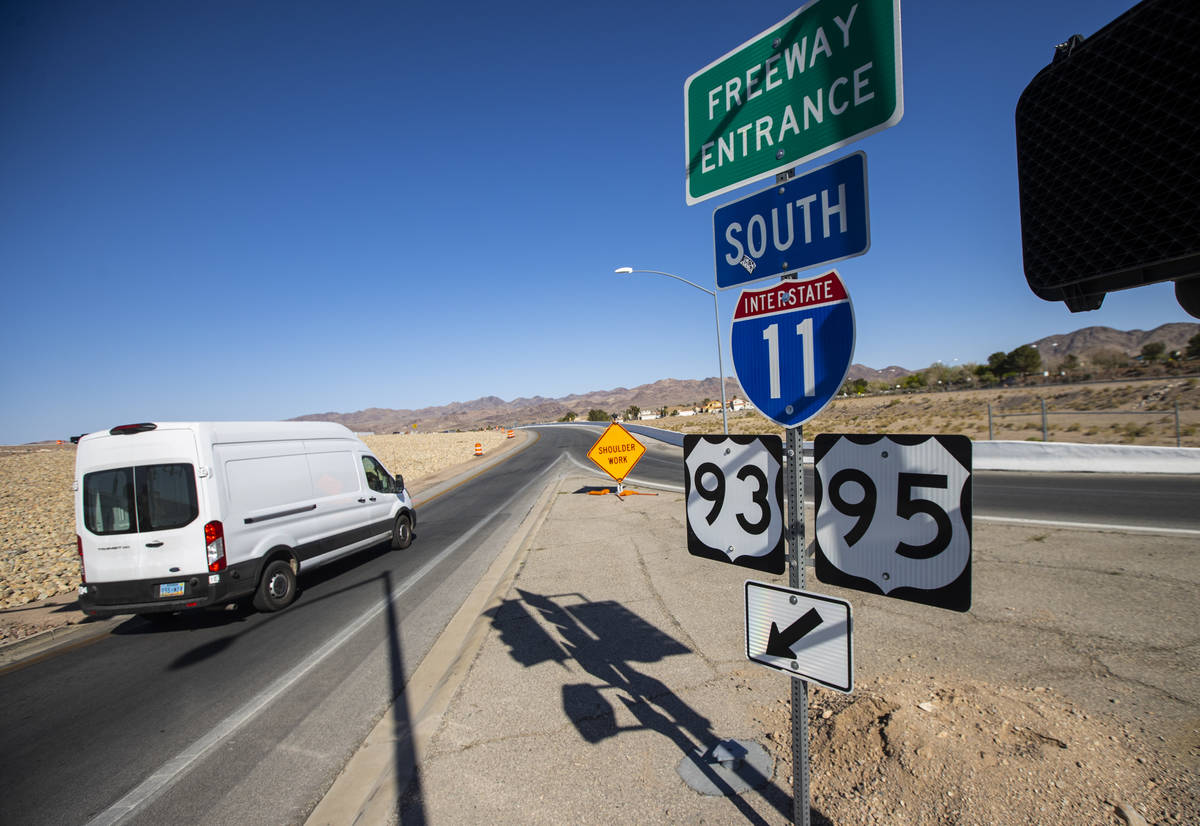 A van moves along the southbound on-ramp for Interstate 11 at College Drive in Henderson on Wed ...