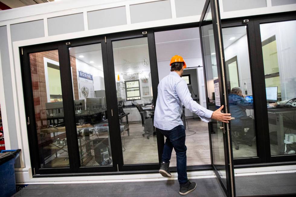 Galiano Tiramani, co-founder of Boxabl, walks into one of the company's accessory dwelling unit ...
