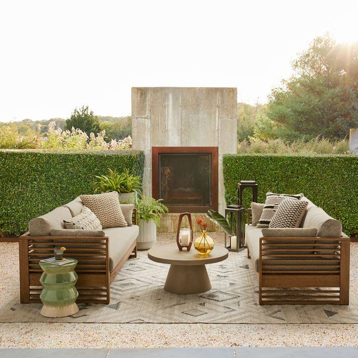 Wood slat details put a contemporary spin on the classic outdoor Santa Fe sofa from West Elm. ( ...