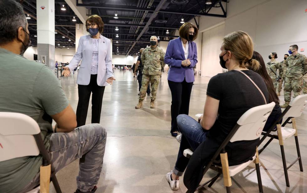 Nevada Senators Jacky Rosen, left, and Catherine Cortez Masto meet with vaccine recipients, sea ...