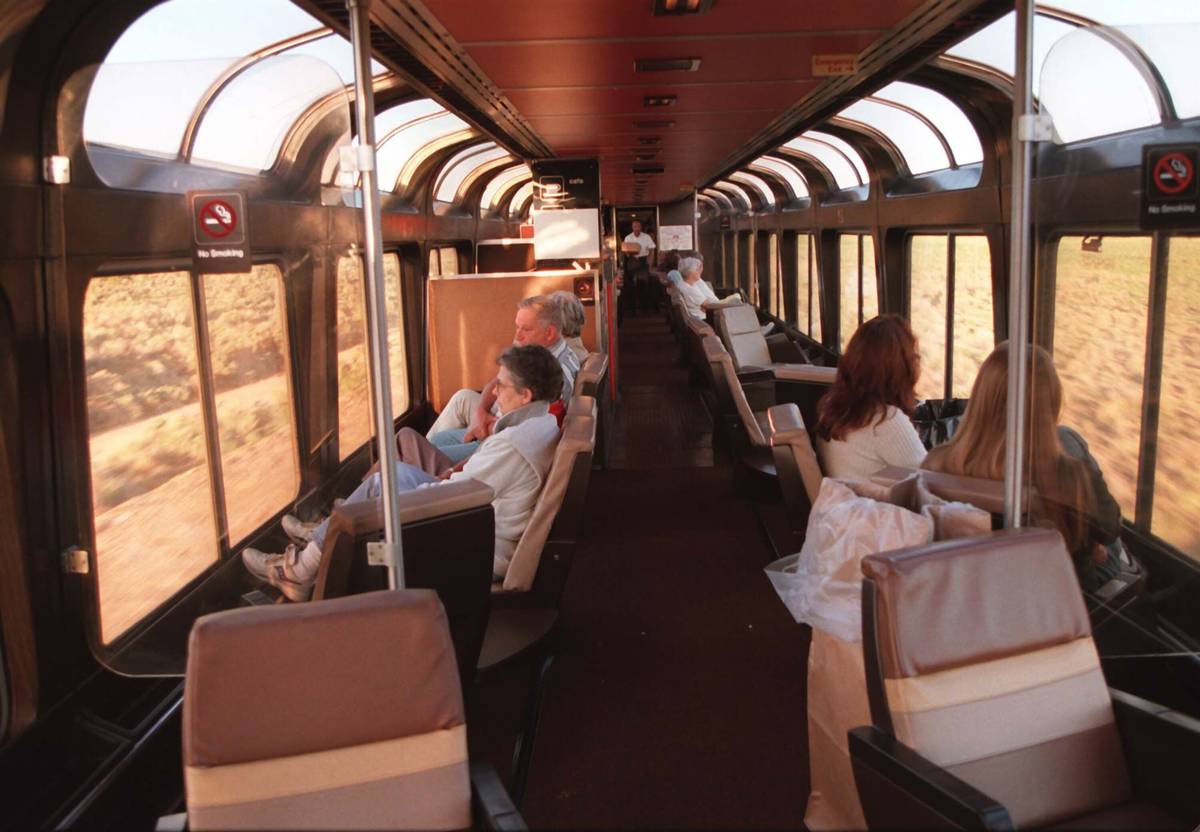 As the Amtrak's Desert Wind heads towards Las Vegas, passengers enjoy the scenery and conversat ...