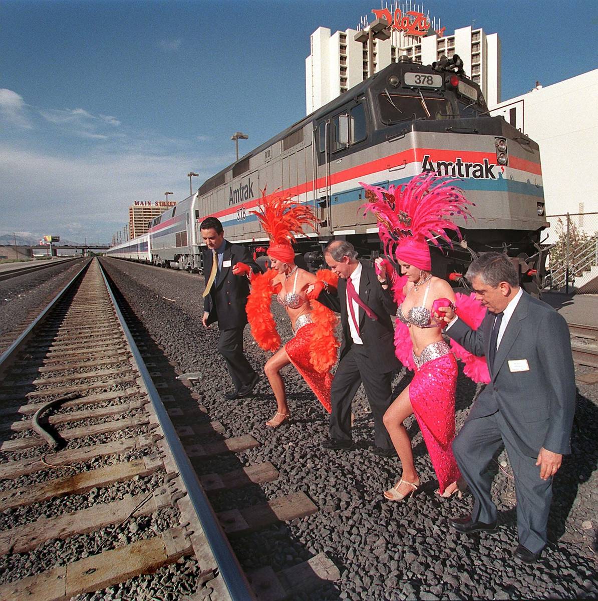 Railroad executives Gustavo Gonzalez, from left, Gil Mallery and Lucas Oriol assist Las Vegas s ...