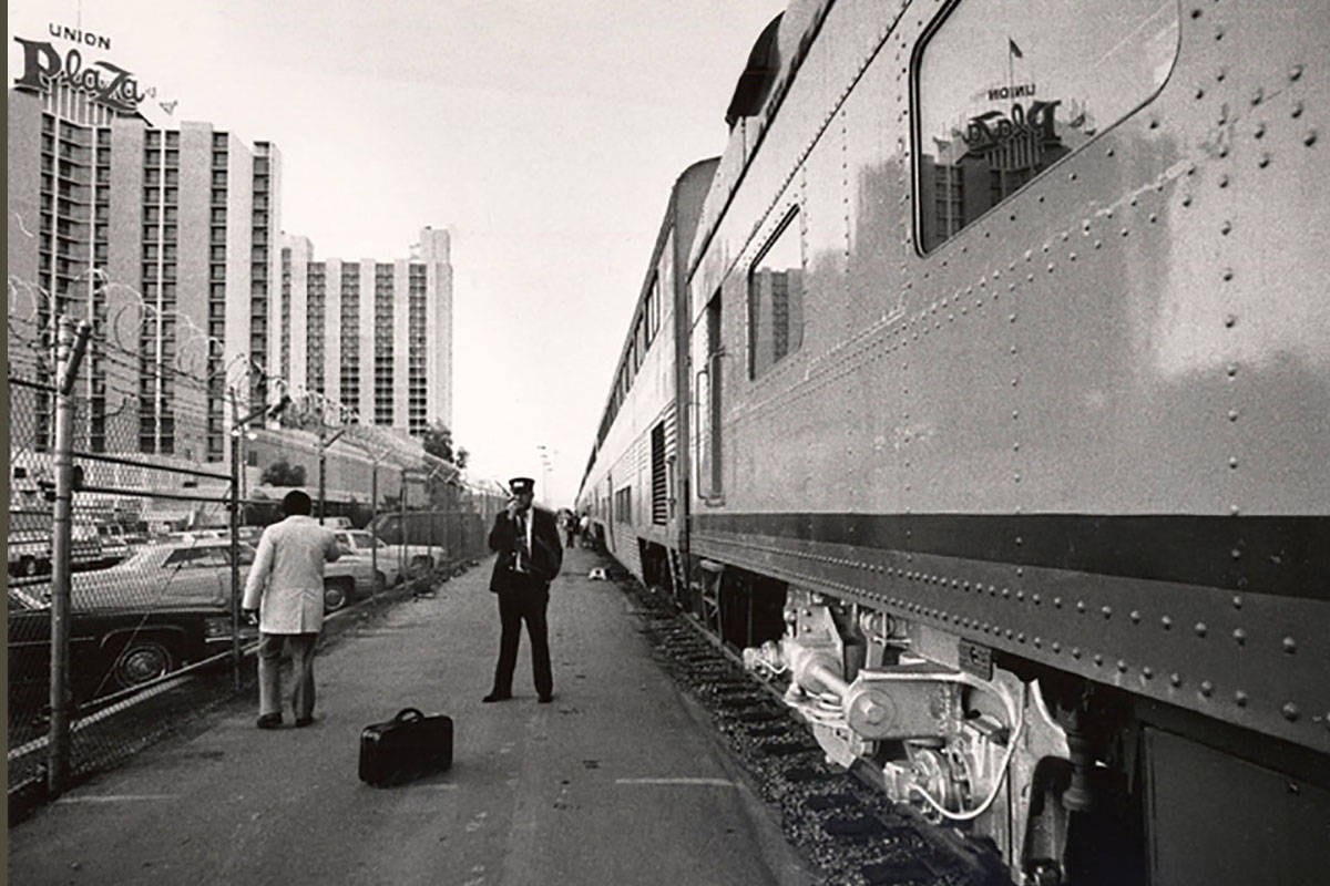 An Amtrak train is seen next to The Plaza hotel-casino in downtown Las Vegas on Oct. 24, 1986. ...