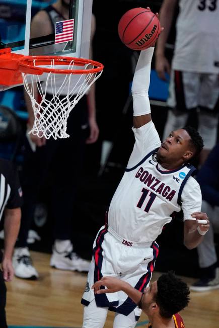 Gonzaga guard Joel Ayayi (11) dunks the ball during the second half of an Elite 8 game against ...