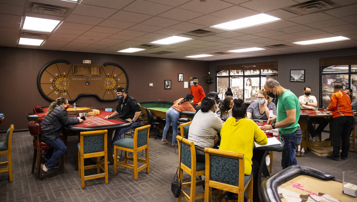 Students work with different table games during class at the Crescent School of Gaming and Bart ...