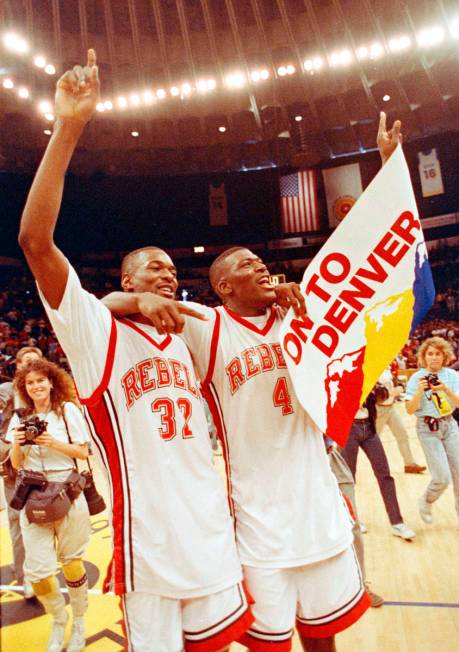 UNLV forwards Stacey Augmon, left, and Larry Johnson celebrate their win over Loyola Marymount ...