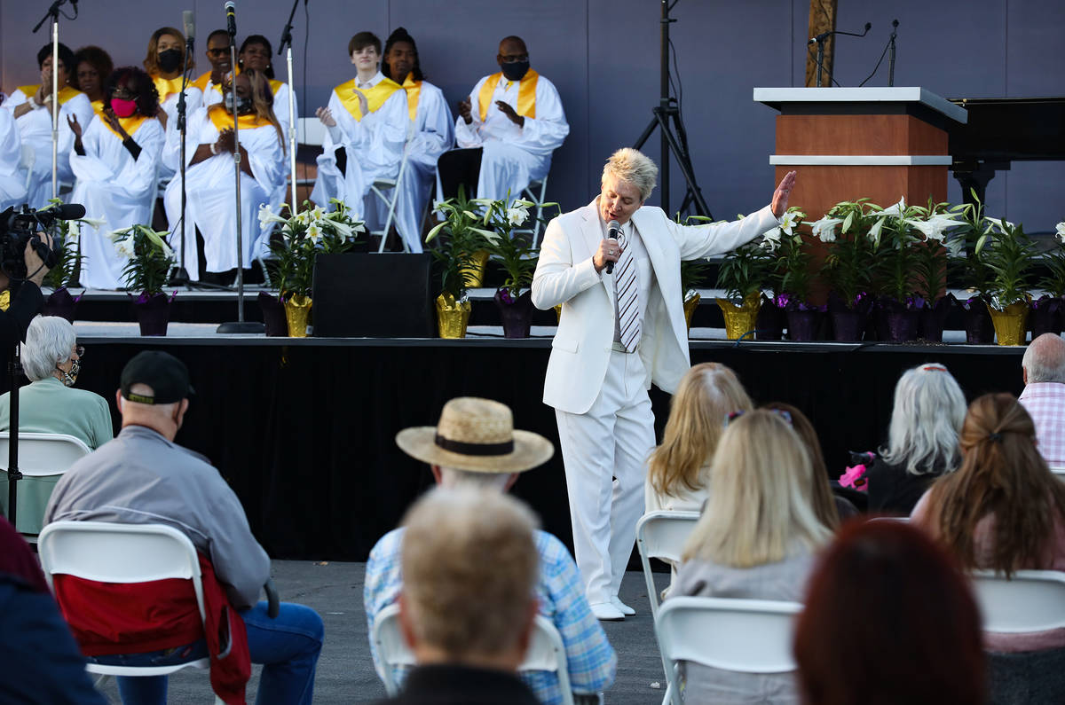 Pastor Bill Walker sings at the 36th Annual Easter Sunrise Service at Palm Mortuary on Sunday, ...