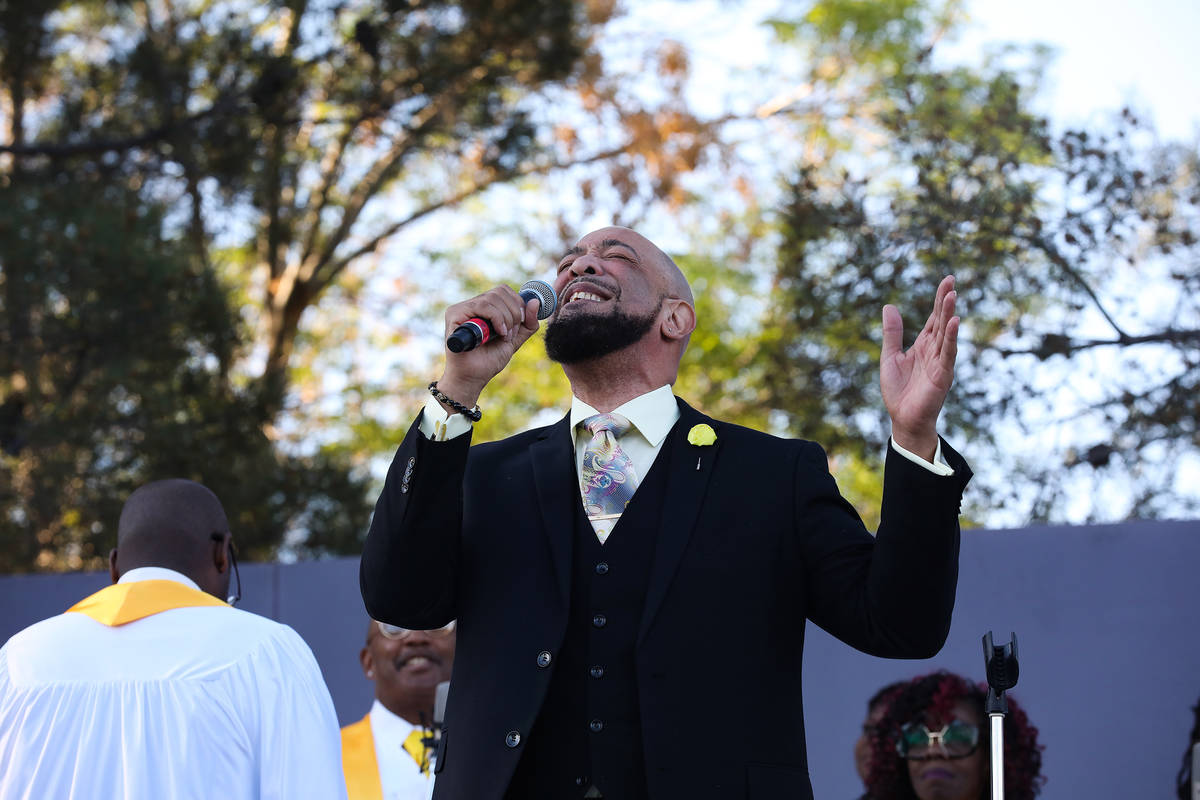 James Smith sings alongside the Las Vegas Mass Choir at the 36th Annual Easter Sunrise Service ...