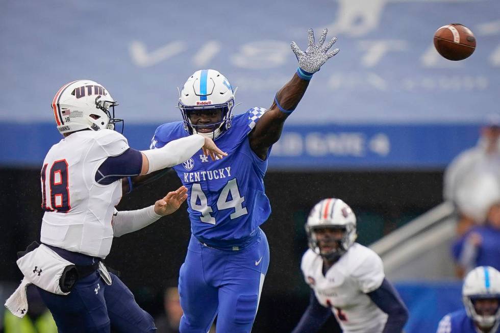 Kentucky linebacker Jamin Davis (44) rushes UT Martin quarterback John Bachus III (18) during t ...