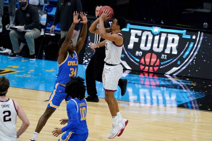 Gonzaga guard Jalen Suggs (1) shoots over UCLA guard David Singleton (34) to win the game durin ...