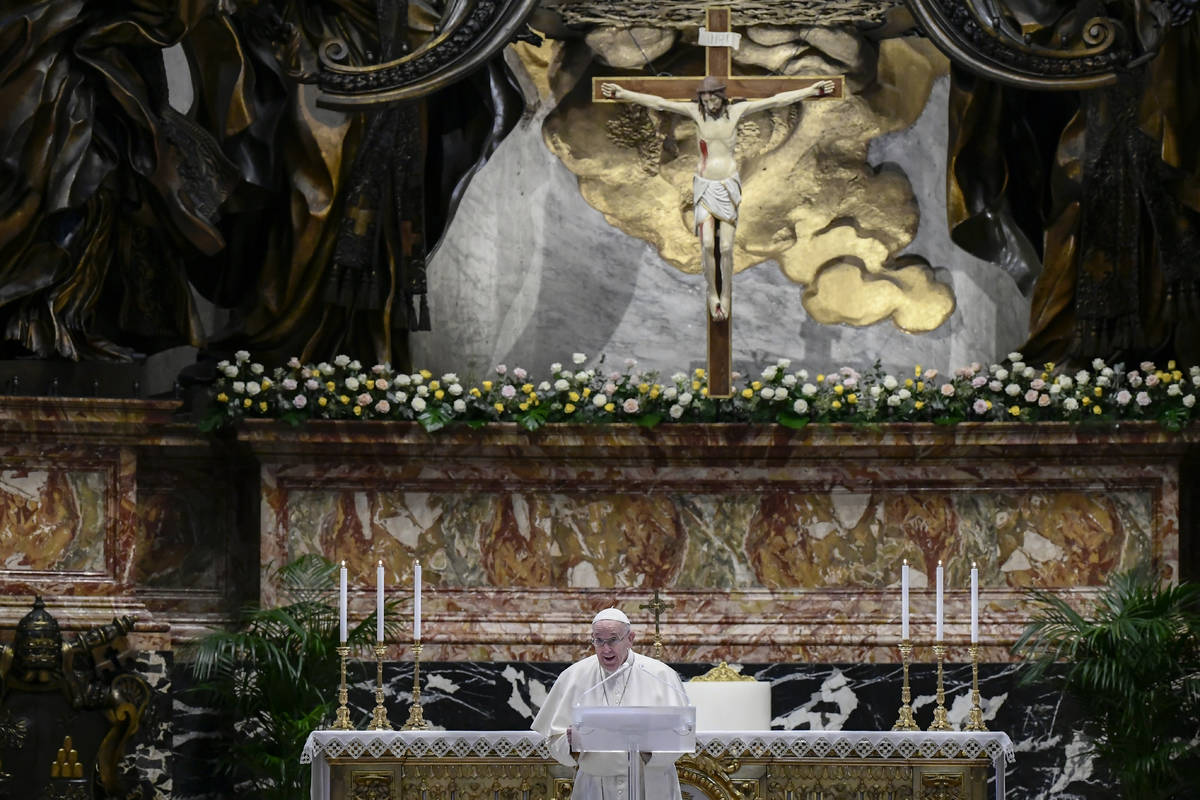 Pope Francis speaks prior to delivering his Urbi et Orbi blessing after celebrating Easter Mass ...
