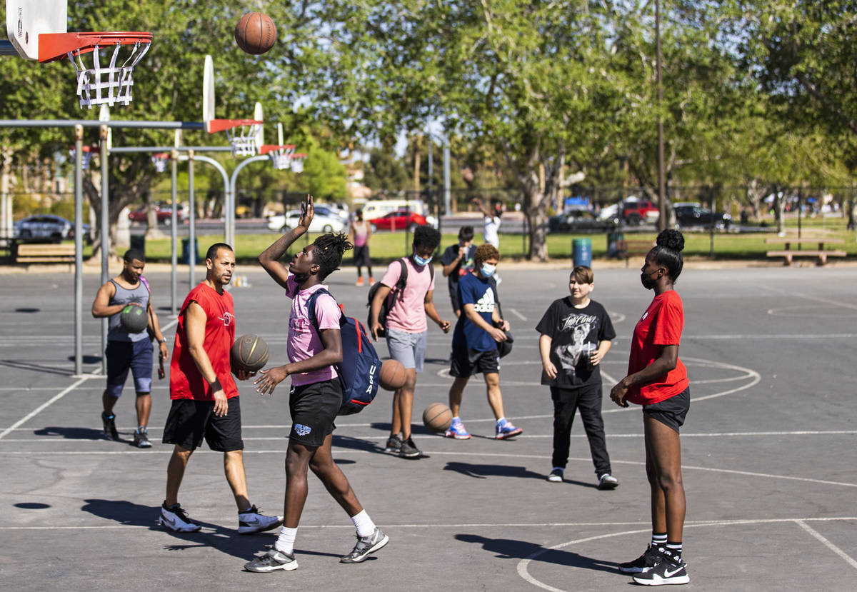 Players shoot around at Sunset Park on Saturday, April 3, 2021, in Las Vegas. The backboards we ...